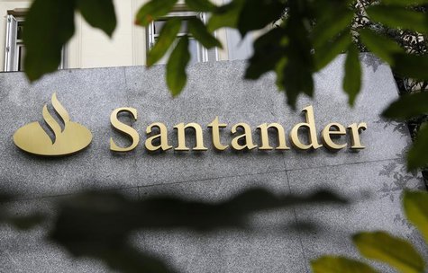 The logo of Spanish bank Santander is seen outside a building in Madrid October 27, 2011.REUTERS/Andrea Comas The logo of Spanish bank Santander is seen outside a building in Madrid October 27, 2011.REUTERS/Andrea Comas