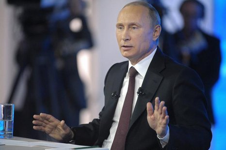 Russian President Vladimir Putin takes part in a live broadcast nationwide phone-in in Moscow April 17, 2014. REUTERS/Alexei Druzhinin/RIA N Russian President Vladimir Putin takes part in a live broadcast nationwide phone-in in Moscow April 17, 2014. REUTERS/Alexei Druzhinin/RIA N