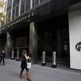 Pedestrians walk past the world headquarters of Pfizer in New York November 5, 2013. REUTERS/Adam Hunger Pedestrians walk past the world headquarters of Pfizer in New York November 5, 2013. REUTERS/Adam Hunger