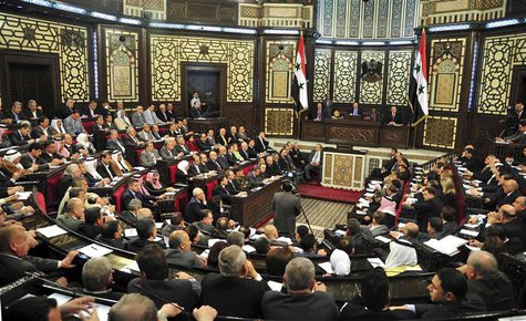Members of the Syrian parliament attend a session to set a date for voting for the presidential election,in Damascus April 21, 2014, in this Members of the Syrian parliament attend a session to set a date for voting for the presidential election,in Damascus April 21, 2014, in this