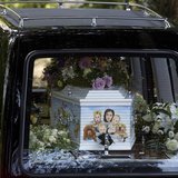 A hearse carrying the coffin of Peaches Geldof, painted with a picture of her family, arrives for her funeral service at the St Mary Magdale A hearse carrying the coffin of Peaches Geldof, painted with a picture of her family, arrives for her funeral service at the St Mary Magdale