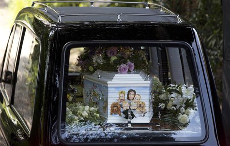 A hearse carrying the coffin of Peaches Geldof, painted with a picture of her family, arrives for her funeral service at the St Mary Magdale A hearse carrying the coffin of Peaches Geldof, painted with a picture of her family, arrives for her funeral service at the St Mary Magdale