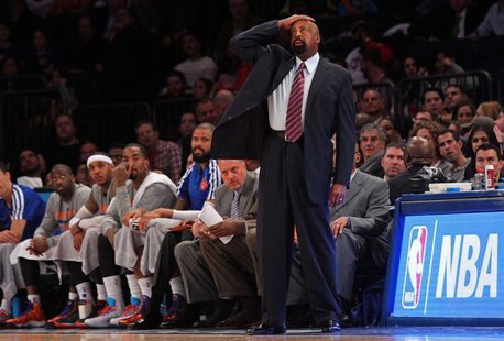 Feb 28, 2014; New York, NY, USA; New York Knicks head coach Mike Woodson reacts in the second half against the Golden State Warriors at Madi Feb 28, 2014; New York, NY, USA; New York Knicks head coach Mike Woodson reacts in the second half against the Golden State Warriors at Madi
