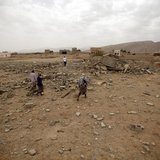 Tribesmen stand on the rubble of a building destroyed by a U.S. drone air strike, that targeted suspected al Qaeda militants in Azan of the Tribesmen stand on the rubble of a building destroyed by a U.S. drone air strike, that targeted suspected al Qaeda militants in Azan of the