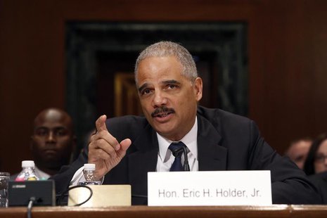 U.S. Attorney General Eric Holder testifies about his FY2015 budget request at a Senate Appropriations Committee hearing on Capitol Hill in U.S. Attorney General Eric Holder testifies about his FY2015 budget request at a Senate Appropriations Committee hearing on Capitol Hill in