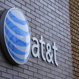 An AT&T sign is shown on a building in downtown San Diego, California March 18, 2014. REUTERS/Mike Blake An AT&T sign is shown on a building in downtown San Diego, California March 18, 2014. REUTERS/Mike Blake