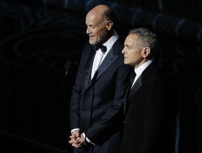Craig Zadan and Neil Meron, Academy Award Producers, look on at the 86th Academy Awards in Hollywood, California March 2, 2014. REUTERS/Lucy Craig Zadan and Neil Meron, Academy Award Producers, look on at the 86th Academy Awards in Hollywood, California March 2, 2014. REUTERS/Lucy