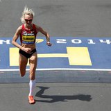 Apr 21, 2014; Boston, MA, USA; Shalane Flanagan (USA) crosses the finish line during the 2014 Boston Marathon. Mandatory Credit: Greg M. Coo Apr 21, 2014; Boston, MA, USA; Shalane Flanagan (USA) crosses the finish line during the 2014 Boston Marathon. Mandatory Credit: Greg M. Coo