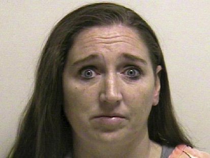 Megan Huntsman is shown in this booking photo provided by the Pleasant Grove County Jail in Pleasant Grove, Utah April 13, 2014. REUTERS/Ple Megan Huntsman is shown in this booking photo provided by the Pleasant Grove County Jail in Pleasant Grove, Utah April 13, 2014. REUTERS/Ple