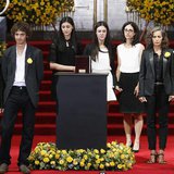 The grandchildren and other relatives of Colombian Nobel laureate Gabriel Garcia Marquez stand around the urn containing his ashes for publi The grandchildren and other relatives of Colombian Nobel laureate Gabriel Garcia Marquez stand around the urn containing his ashes for publi
