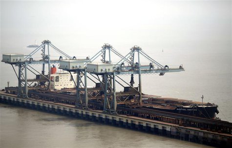 The Baosteel Emotion, a 226,434 deadweight-tonne ore carrier owned by Mitsui O.S.K. Lines, is docked at the port of Maji Island, south of Sh The Baosteel Emotion, a 226,434 deadweight-tonne ore carrier owned by Mitsui O.S.K. Lines, is docked at the port of Maji Island, south of Sh
