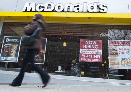 A passersby walks in front of a help wanted sign at a McDonalds restaurant in the Brooklyn borough of New York, March 7, 2014. REUTERS/Keith A passersby walks in front of a help wanted sign at a McDonalds restaurant in the Brooklyn borough of New York, March 7, 2014. REUTERS/Keith