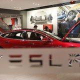 A man looks around Tesla Motors' Model S P85 at its showroom in Beijing January 29, 2014. REUTERS/Kim Kyung-Hoon A man looks around Tesla Motors' Model S P85 at its showroom in Beijing January 29, 2014. REUTERS/Kim Kyung-Hoon