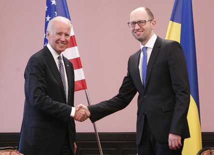 U.S. Vice President Joe Biden (L) shakes hands with Ukraine's Prime Minister Arseny Yatseniuk during a meeting in Kiev, April 22, 2014. REUT U.S. Vice President Joe Biden (L) shakes hands with Ukraine's Prime Minister Arseny Yatseniuk during a meeting in Kiev, April 22, 2014. REUT