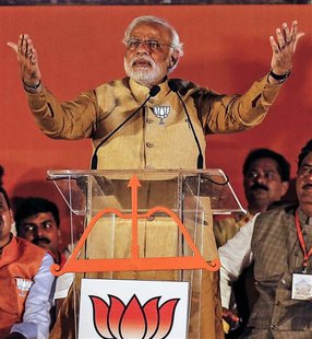 Hindu nationalist Narendra Modi, prime ministerial candidate for the main opposition Bharatiya Janata Party (BJP), gestures as he addresses Hindu nationalist Narendra Modi, prime ministerial candidate for the main opposition Bharatiya Janata Party (BJP), gestures as he addresses