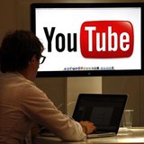 The YouTube logo is seen on a screen in a file photo. REUTERS/Eric Gaillard The YouTube logo is seen on a screen in a file photo. REUTERS/Eric Gaillard