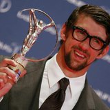 U.S. Olympic swimmer Michael Phelps poses with his Special Laureus Award during the 2013 Laureus World Sports Awards, at Municipal Theater i U.S. Olympic swimmer Michael Phelps poses with his Special Laureus Award during the 2013 Laureus World Sports Awards, at Municipal Theater i