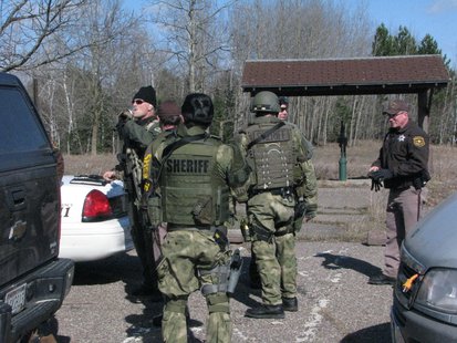 SWAT team officers at staging area near Wittenberg hostage incident 4/22/14 Photo: WSAU
SWAT team officers at staging area near Wittenberg hostage incident 4/22/14 Photo: WSAU