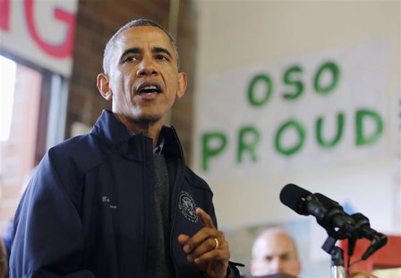U.S. President Barack Obama speaks to first responders after touring the mudslide damage in Oso, Washington, April 22, 2014. REUTERS/Larry D U.S. President Barack Obama speaks to first responders after touring the mudslide damage in Oso, Washington, April 22, 2014. REUTERS/Larry D