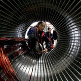 A worker assembles a generator at a factory in Hefei, Anhui province November 2, 2013. REUTERS/China Daily A worker assembles a generator at a factory in Hefei, Anhui province November 2, 2013. REUTERS/China Daily