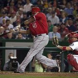 Apr 22, 2014; Washington, DC, USA; Los Angeles Angels first baseman Albert Pujols (5) hits a two-run home run during the fifth inning agains Apr 22, 2014; Washington, DC, USA; Los Angeles Angels first baseman Albert Pujols (5) hits a two-run home run during the fifth inning agains