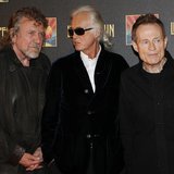 Led Zeppelin singer Robert Plant (L), guitarist Jimmy Page (C) and bassist/keyboardist John Paul Jones pose for photographers as they arrive Led Zeppelin singer Robert Plant (L), guitarist Jimmy Page (C) and bassist/keyboardist John Paul Jones pose for photographers as they arrive