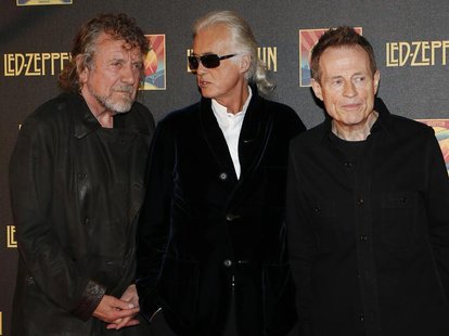 Led Zeppelin singer Robert Plant (L), guitarist Jimmy Page (C) and bassist/keyboardist John Paul Jones pose for photographers as they arrive Led Zeppelin singer Robert Plant (L), guitarist Jimmy Page (C) and bassist/keyboardist John Paul Jones pose for photographers as they arrive