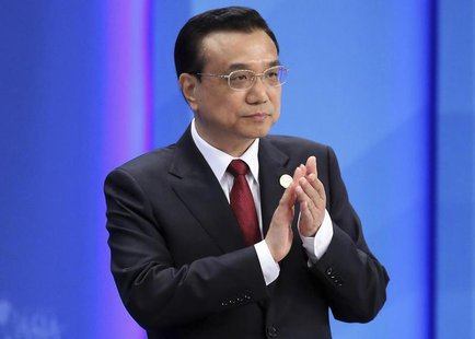 Chinese Premier Li Keqiang claps as he attends the opening ceremony of the Boao Forum for Asia (BFA) Annual Conference 2014 in Boao, Hainan Chinese Premier Li Keqiang claps as he attends the opening ceremony of the Boao Forum for Asia (BFA) Annual Conference 2014 in Boao, Hainan