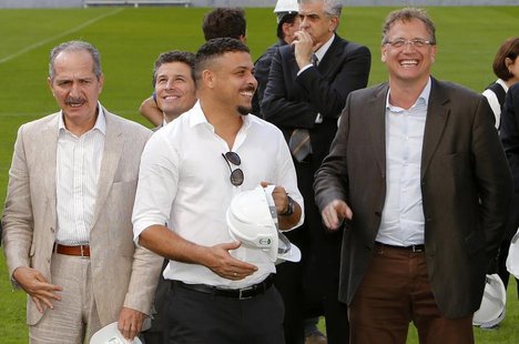 FIFA Secretary General Jerome Valcke (R), Brazil's former soccer player and member of the Local Organizing Committee Ronaldo and Brazil's Sp FIFA Secretary General Jerome Valcke (R), Brazil's former soccer player and member of the Local Organizing Committee Ronaldo and Brazil's Sp