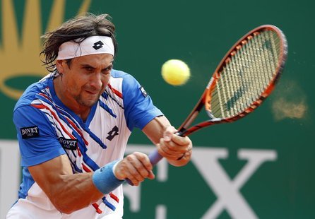 David Ferrer of Spain returns the ball to his compatriot Rafael Nadal during their quarter-final match at the Monte Carlo Masters in Monaco David Ferrer of Spain returns the ball to his compatriot Rafael Nadal during their quarter-final match at the Monte Carlo Masters in Monaco