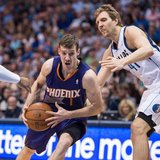 Apr 12, 2014; Dallas, TX, USA; Phoenix Suns guard Goran Dragic (1) drives to the basket past Dallas Mavericks forward Shawn Marion (0) and f Apr 12, 2014; Dallas, TX, USA; Phoenix Suns guard Goran Dragic (1) drives to the basket past Dallas Mavericks forward Shawn Marion (0) and f
