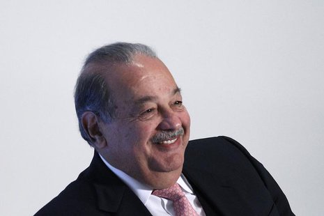Mexican billionaire Carlos Slim smiles during the presentation of a digital platform to promote Mexico's natural heritage inside Soumaya mus Mexican billionaire Carlos Slim smiles during the presentation of a digital platform to promote Mexico's natural heritage inside Soumaya mus