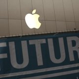 The Apple logo is pictured on the front of the company's flagship retail store near signs for the central subway project in San Francisco, C The Apple logo is pictured on the front of the company's flagship retail store near signs for the central subway project in San Francisco, C