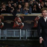 Actor Sam Claflin reacts as he arrives for the world premiere of "The Hunger Games : Catching Fire" at Leicester Square in London November 1 Actor Sam Claflin reacts as he arrives for the world premiere of "The Hunger Games : Catching Fire" at Leicester Square in London November 1