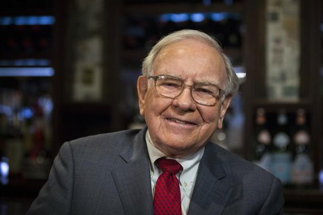 Investor Warren Buffett poses for a portrait during an interview after a luncheon to benefit the Glide Foundation of San Francisco in New Yo Investor Warren Buffett poses for a portrait during an interview after a luncheon to benefit the Glide Foundation of San Francisco in New Yo