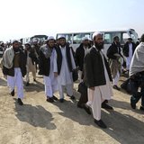 Afghan prisoners walk outside the Parwan Detention Facility after their release in Bagram Airbase, northern Kabul, March 20, 2014. REUTERS/O Afghan prisoners walk outside the Parwan Detention Facility after their release in Bagram Airbase, northern Kabul, March 20, 2014. REUTERS/O