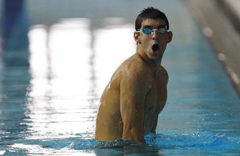 U.S. Olympic medallist Michael Phelps teaches Chinese Special Olympics athletes how to swim during an event in the Special Olympics in Shang U.S. Olympic medallist Michael Phelps teaches Chinese Special Olympics athletes how to swim during an event in the Special Olympics in Shang