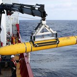 Crew aboard the Australian Defence Vessel Ocean Shield move the U.S. Navy's Bluefin-21 autonomous underwater vehicle into position for deplo Crew aboard the Australian Defence Vessel Ocean Shield move the U.S. Navy's Bluefin-21 autonomous underwater vehicle into position for deplo