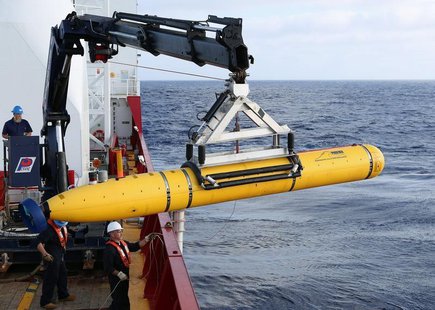 Crew aboard the Australian Defence Vessel Ocean Shield move the U.S. Navy's Bluefin-21 autonomous underwater vehicle into position for deplo Crew aboard the Australian Defence Vessel Ocean Shield move the U.S. Navy's Bluefin-21 autonomous underwater vehicle into position for deplo