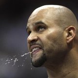 St. Louis Cardinals first baseman Albert Pujols spits in the dugout during Game 2 of the MLB National League Championship Series baseball pl St. Louis Cardinals first baseman Albert Pujols spits in the dugout during Game 2 of the MLB National League Championship Series baseball pl