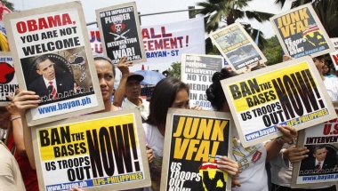 Protesters hold signs outside the U.S. Embassy in Manila in anticipation of President Obama's Asia trip. REUTERS/Romeo Ronoco Protesters hold signs outside the U.S. Embassy in Manila in anticipation of President Obama's Asia trip. REUTERS/Romeo Ronoco