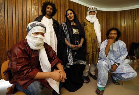 Mali's Cheikh Ag Tiglia, Ousmane Ag Mossa, Wonou Walet Sidati, Ibrahim Ag Ahmed Salem, and Aghaly Ag Mohammedi (L-R) of the Touareg desert b Mali's Cheikh Ag Tiglia, Ousmane Ag Mossa, Wonou Walet Sidati, Ibrahim Ag Ahmed Salem, and Aghaly Ag Mohammedi (L-R) of the Touareg desert b