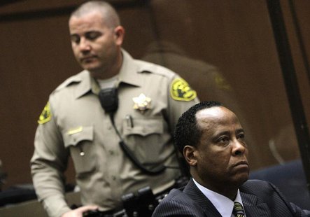 Doctor Conrad Murray (R), the late Michael Jackson's personal physician, listens during his arraignment on a charge of involuntary manslaugh Doctor Conrad Murray (R), the late Michael Jackson's personal physician, listens during his arraignment on a charge of involuntary manslaugh