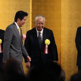 Japan's Prime Minister Shinzo Abe (2nd L) walks past Japan Chamber of Commerce and Industry Chairman Akio Mimura (L), Japan Business Federat Japan's Prime Minister Shinzo Abe (2nd L) walks past Japan Chamber of Commerce and Industry Chairman Akio Mimura (L), Japan Business Federat