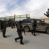 Afghan policemen secure the area outside Cure Hospital after three foreigners were killed in Kabul April 24, 2014. REUTERS/Mohammad Ismail Afghan policemen secure the area outside Cure Hospital after three foreigners were killed in Kabul April 24, 2014. REUTERS/Mohammad Ismail