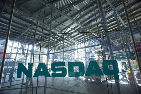 Scaffolding is seen outside the NASDAQ MarketSite in Times Square in New York April 17, 2014. REUTERS/Andrew Kelly Scaffolding is seen outside the NASDAQ MarketSite in Times Square in New York April 17, 2014. REUTERS/Andrew Kelly