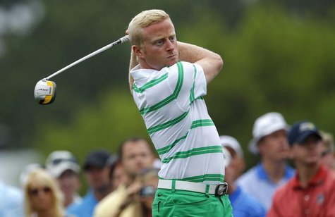Simon Dyson of England hits his tee shot on the 10th hole during a practice round for the 2012 Masters Golf Tournament at the Augusta Nation Simon Dyson of England hits his tee shot on the 10th hole during a practice round for the 2012 Masters Golf Tournament at the Augusta Nation