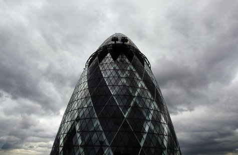 Dark clouds gather over 30 St. Mary Axe, formerly known as the Swiss RE building and also known as the Gherkin, in London August 12, 2010. R Dark clouds gather over 30 St. Mary Axe, formerly known as the Swiss RE building and also known as the Gherkin, in London August 12, 2010. R