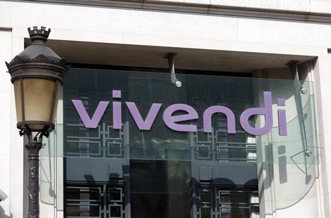 The Vivendi logo is pictured at the main entrance of the entertainment-to-telecoms conglomerate headquarters in Paris March 14, 2014. REUTER The Vivendi logo is pictured at the main entrance of the entertainment-to-telecoms conglomerate headquarters in Paris March 14, 2014. REUTER