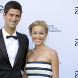 Serbian tennis player Novak Djokovic and his girlfriend Jelena Ristic pose for photographers as they arrive at a fundraising dinner for the Serbian tennis player Novak Djokovic and his girlfriend Jelena Ristic pose for photographers as they arrive at a fundraising dinner for the